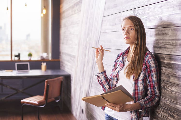 4-woman-thinking-and-writing