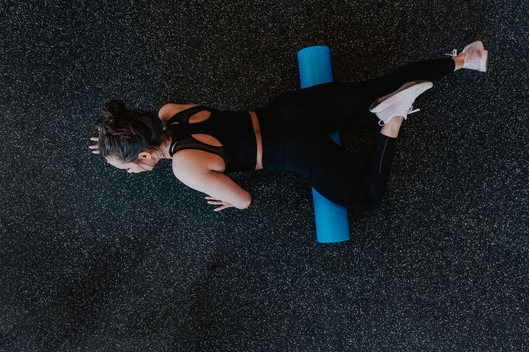 Overhead shot of person using foam roller after a workout