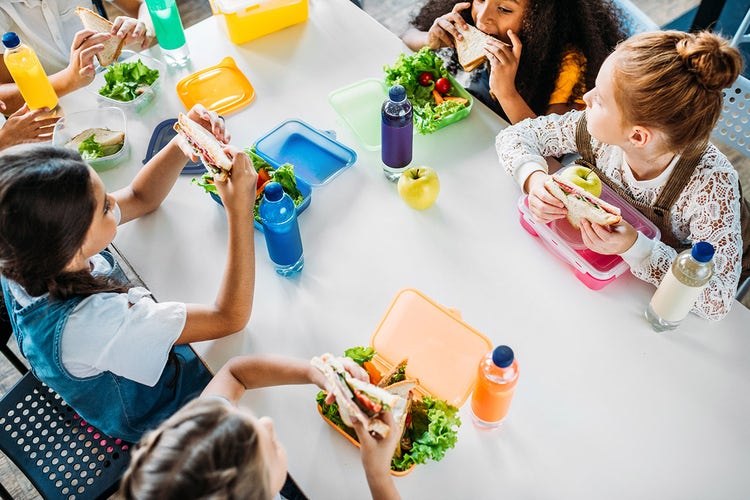 children-eating-healthy-lunches-at-a-table