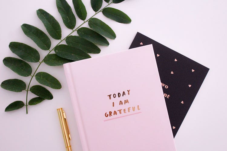 1. Start each day with gratitude, writing down five things you’re grateful for.